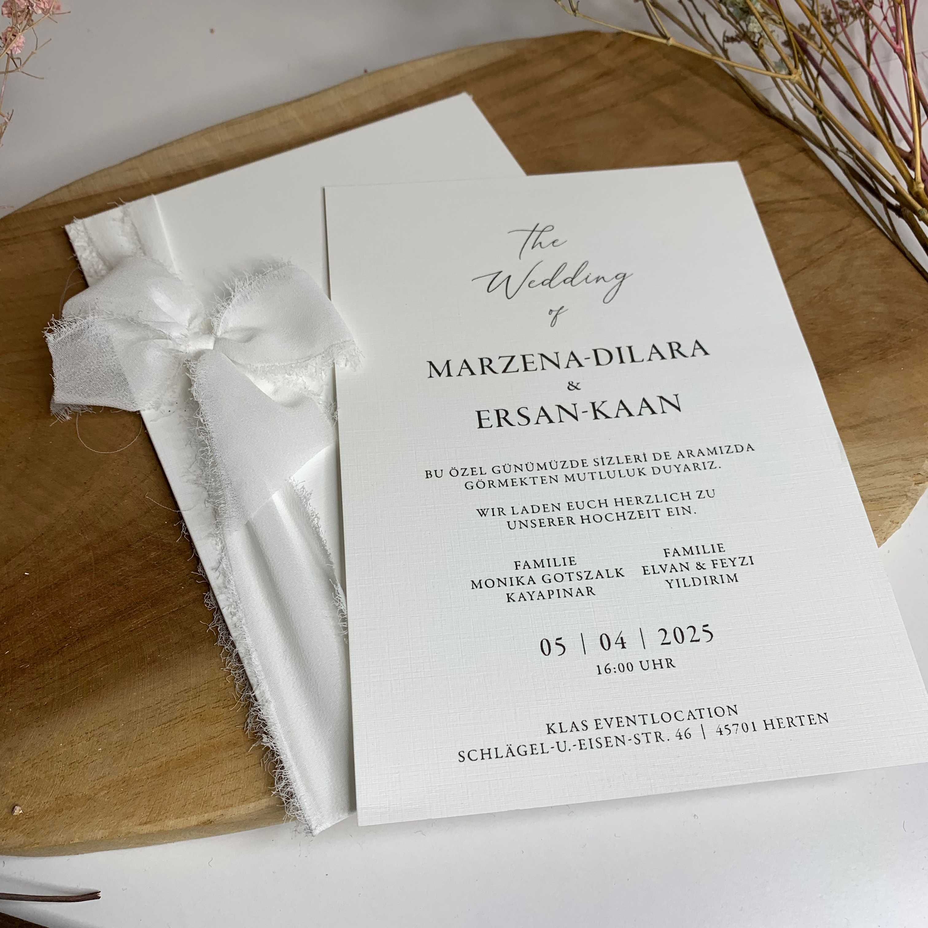 Einladung Blindprägung mit Schleife